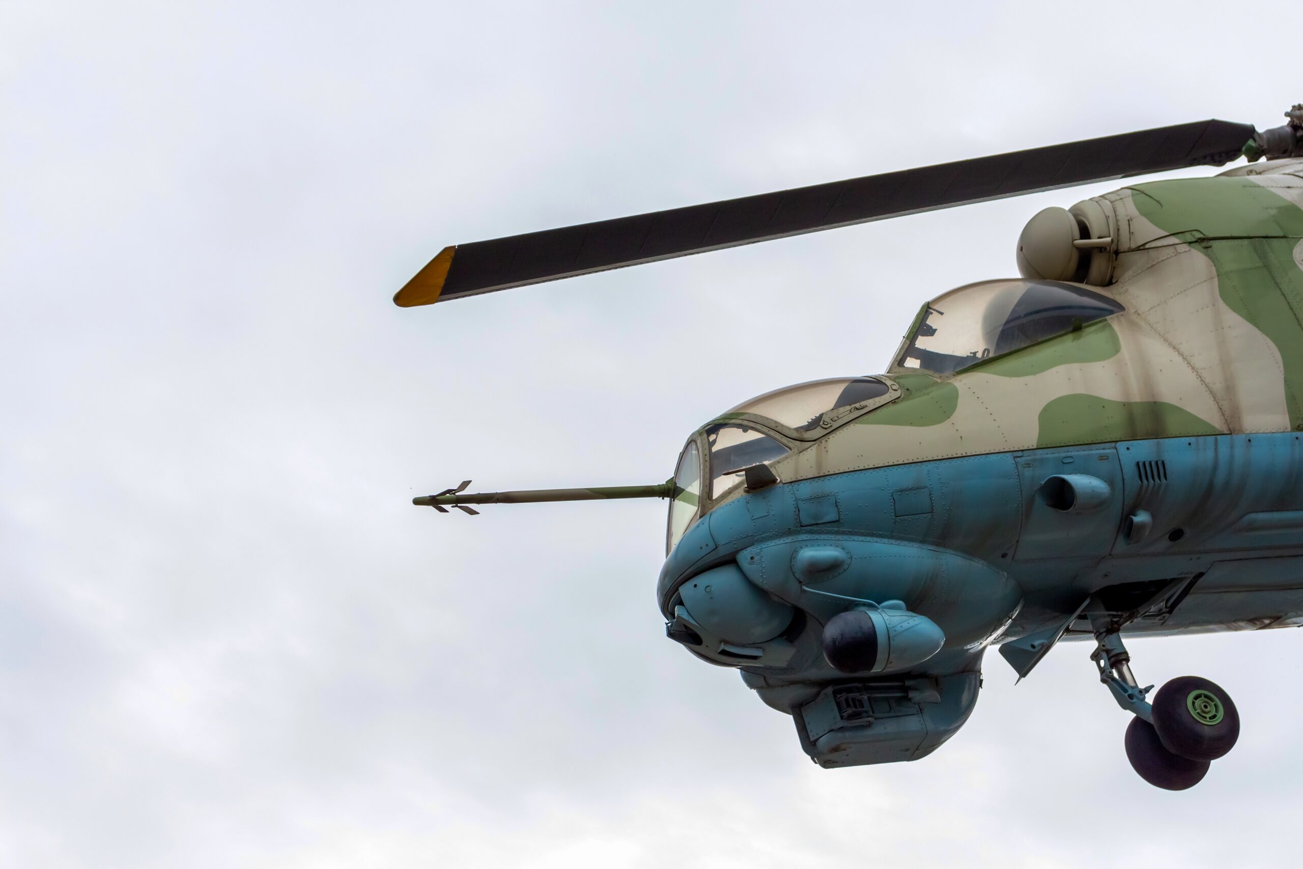 military-helicopter-with-camouflage-against-a-clou-2026-01-06-09-19-29-utc