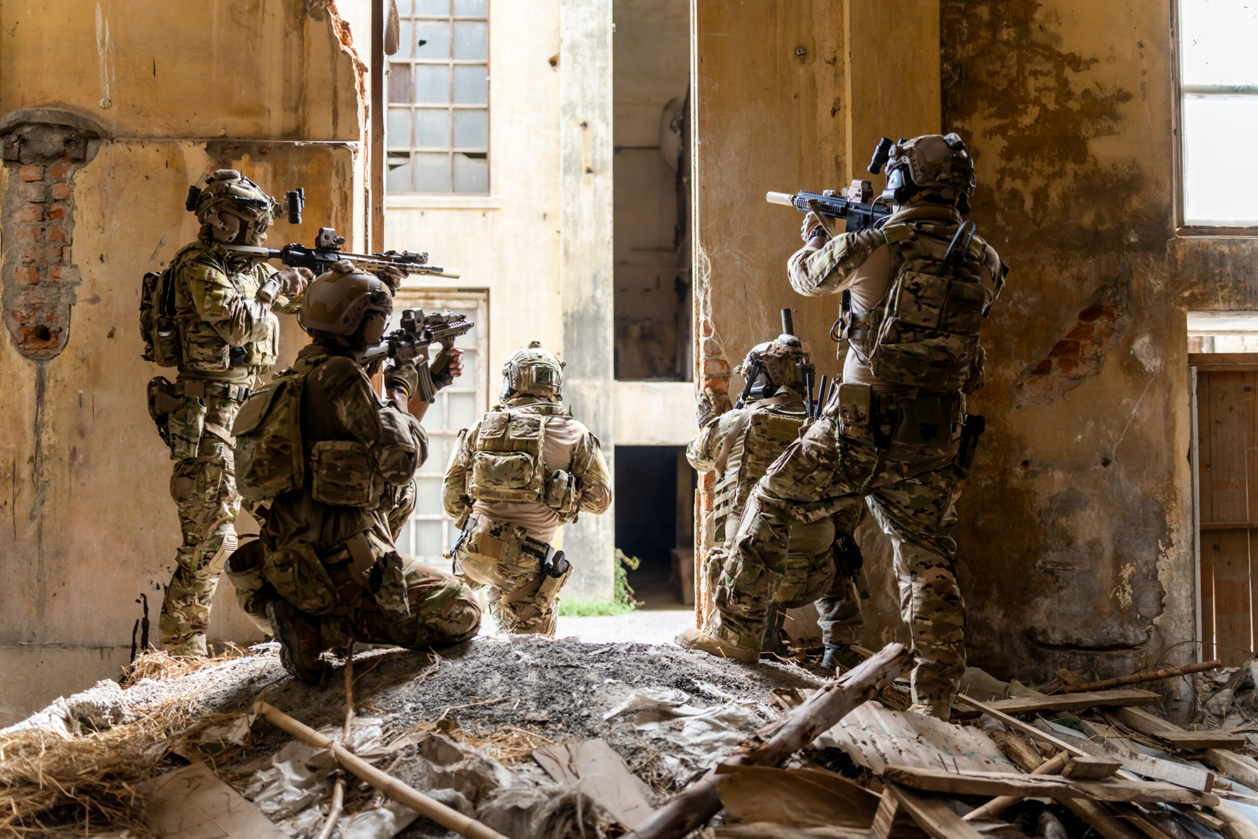 Infantry soldier shooting during military combat training.